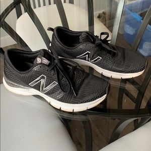 Black and white New Balance athletic shoe